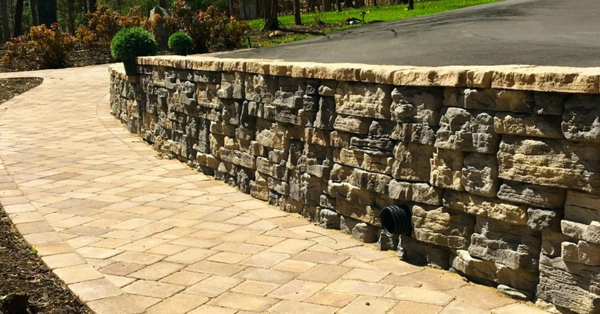 Look Natural with this Stone Wall from Dominion Block, Brick & Hardscapes